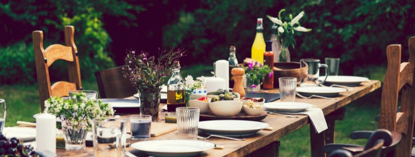 Elaborate dinner table in a garden