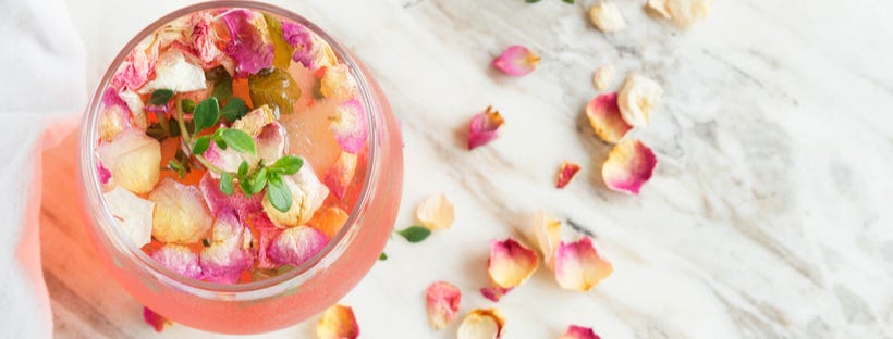 Rose cocktail in a glass, top view